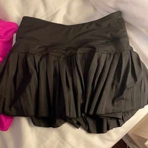 Black gold hinge tennis skirt